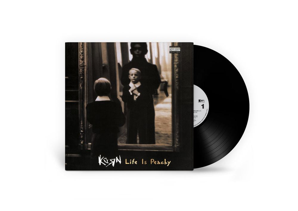 Koss 'Life Is Peacey' vinyl record album with the black LP partially pulled from the sleeve, shown on a clean white background.
