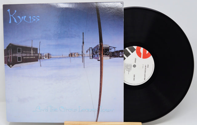 Vinyl record with cover featuring a snowy landscape and 'Kyuss' branding.