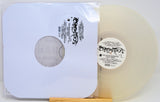 Vinyl record with a clear label and white sleeve on a white background