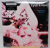 Vinyl record cover featuring a person with a microphone, with 'Cyndi Lauper Memphis Blues' text.