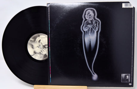 Vinyl record with a ghostly figure on the cover