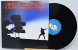 Vinyl record with cover titled 'Home of the Brave' by Laurie Anderson on a white background
