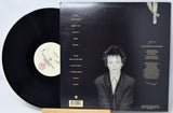 Vinyl record with a portrait on the back cover