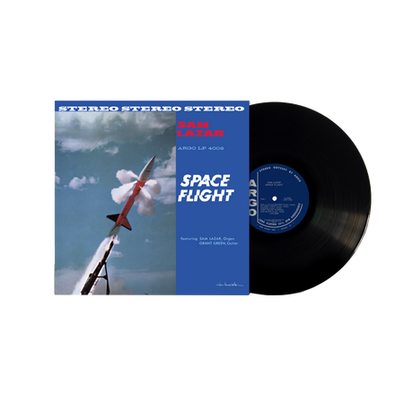 A vinyl record titled 'Space Flight' by Sam Lazar with a space-themed cover featuring a rocket launch.
