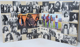Collage of black and white and color photos of people on a wooden board.