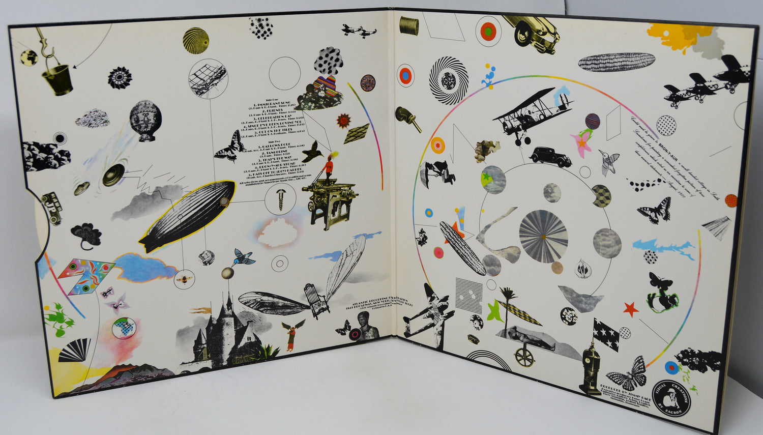 Open book with illustrated pages on a white background
