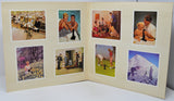 Open photo album with various family photos on a white background