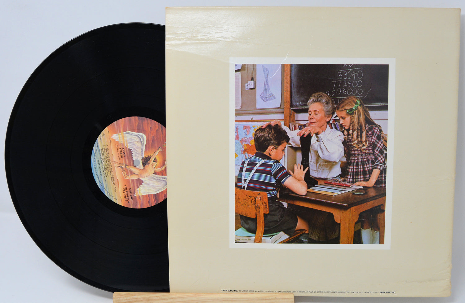 Vinyl record with a cover featuring a classroom scene