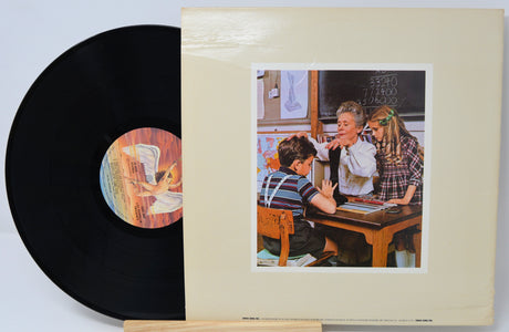 Vinyl record with a cover featuring a classroom scene