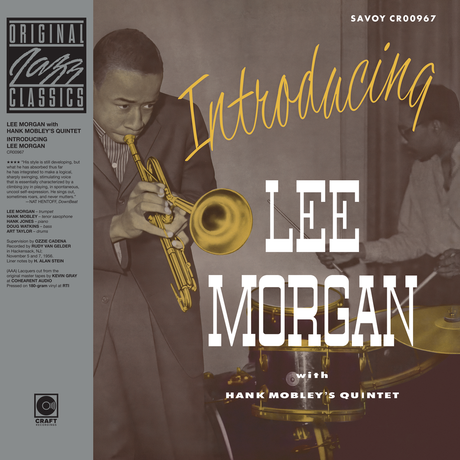 Album cover for 'Introducing Lee Morgan' featuring him playing trumpet and a drummer playing next to him.