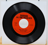 Vinyl record with red label on a white background