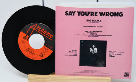 Vinyl record and its cover titled 'Say You're Wrong' by Big Mama on a white background.