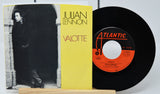Vinyl record and cover with 'Julian Lennon' and 'Atlantic' branding on a white background