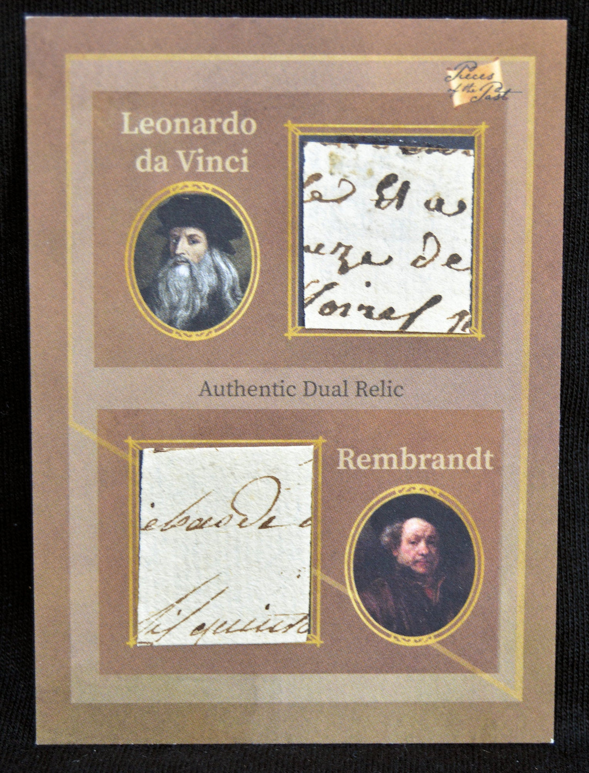 Front of dual relic trading card showing relics and portraits of Leonardo da Vinci and Rembrandt.