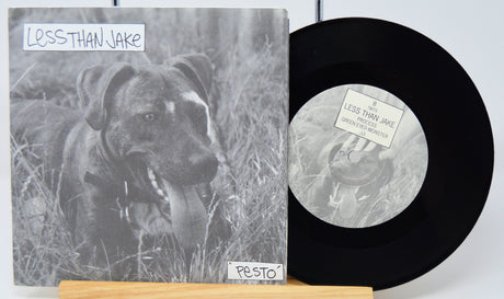 Vinyl record with a dog on the cover and a black vinyl disc.