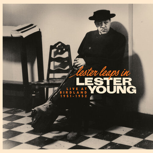 Vinyl album cover of Lester Young 'Leaps In Live At Birdland 1951-1952' featuring a black and white photo of him sitting on a checkered floor with text overlay.