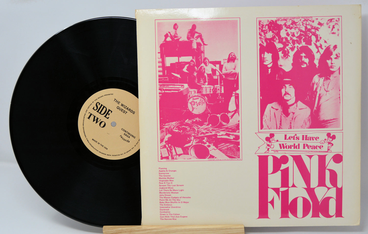Pink Floyd Let's Have World Peace vintage vinyl record and album cover with band photos in pink design