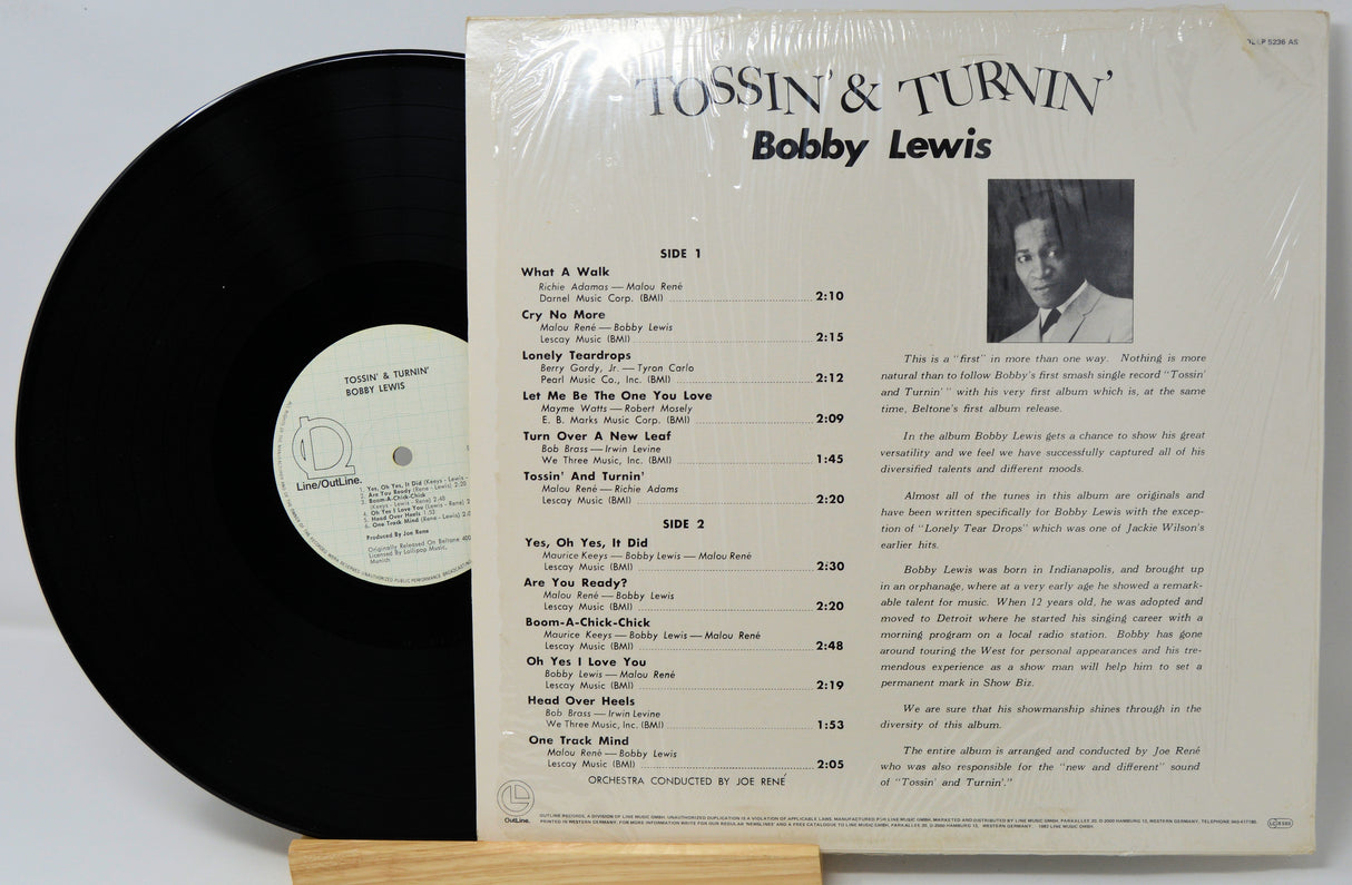 Vinyl record with cover featuring Bobby Lewis on a white background