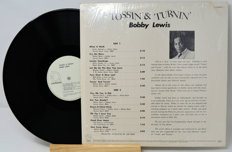 Vinyl record with cover featuring Bobby Lewis on a white background