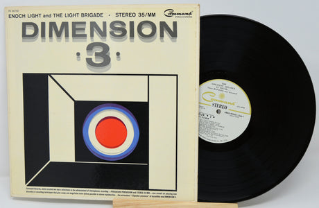 Vinyl record with cover featuring geometric design and text