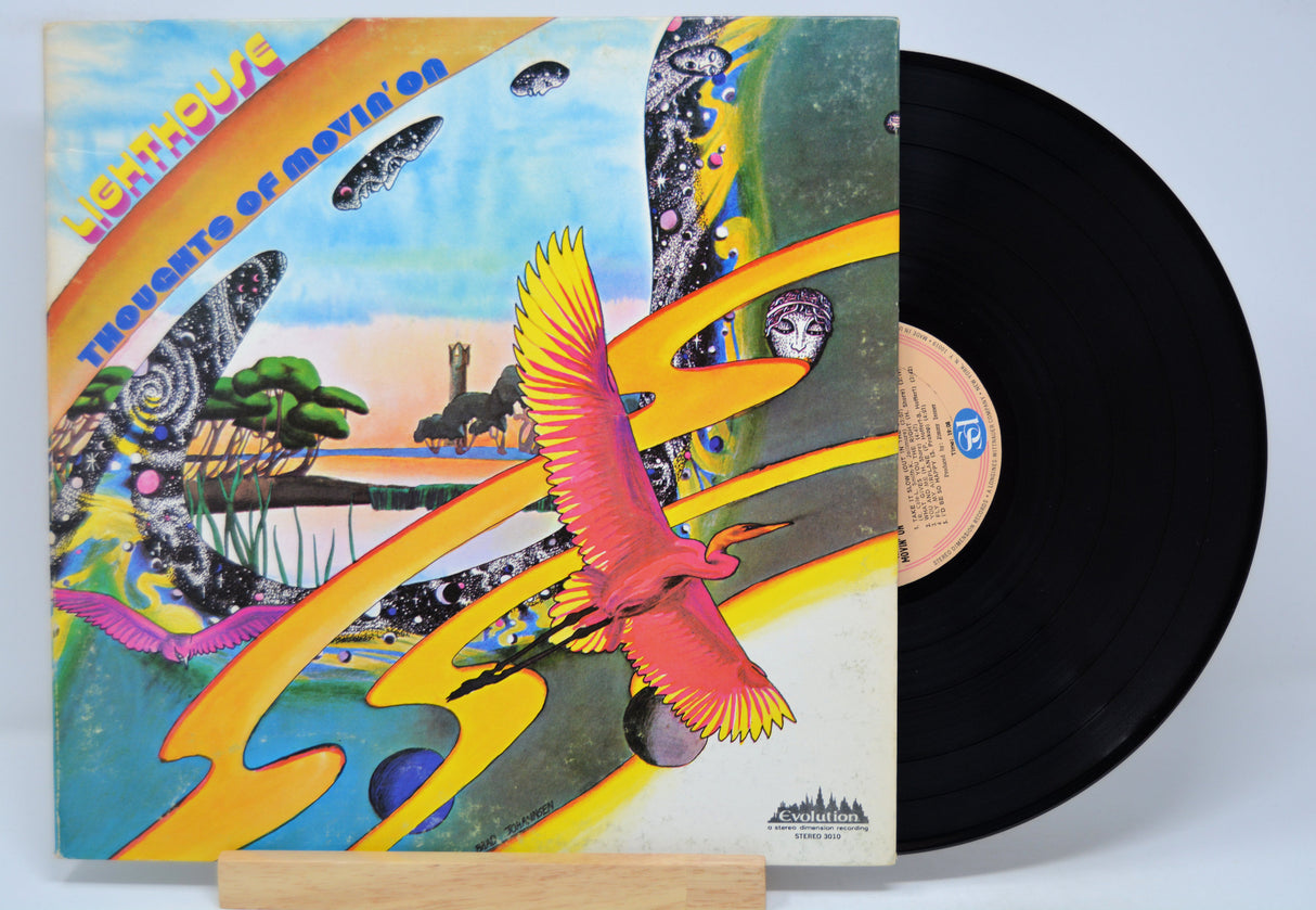 'Lighthouse Thoughts Of Movin On' Vinyl record with a colorful cover featuring a bird and nature-themed design.