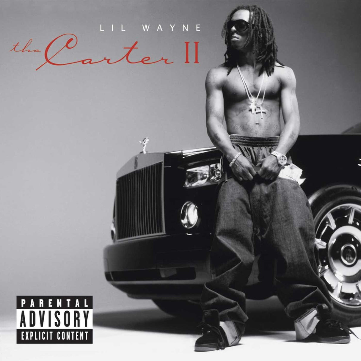 Album cover featuring a person sitting on a car with 'Lil Wayne The Carter II' text.