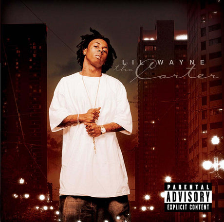 Album cover for Lil Wayne Tha Carter featuring the artist in a white tee against a city backdrop
