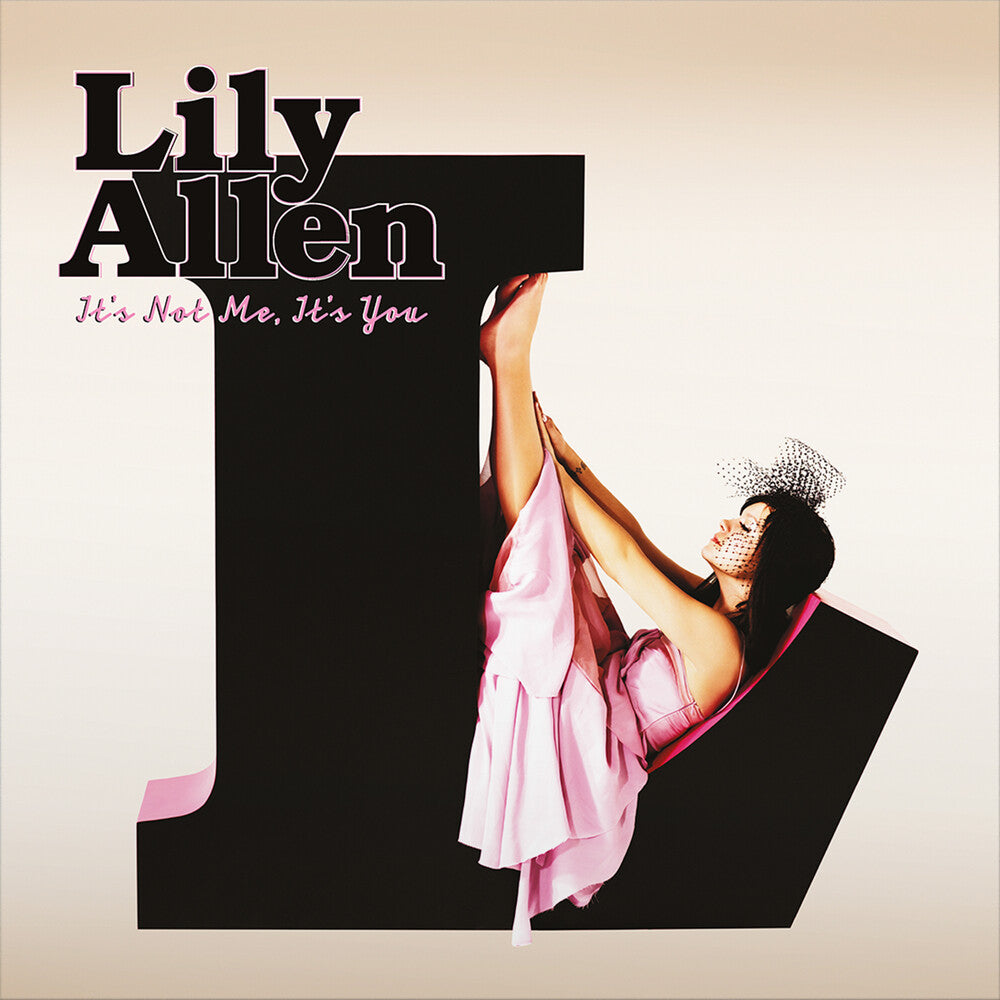 Album cover for Lily Allen's 'It's Not Me, It's You' with a photo of her in a pink dress sitting in an 'L'.