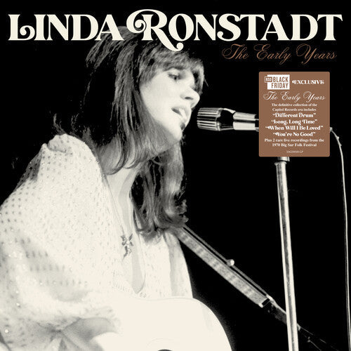 Linda Ronstadt performing live with a guitar on 'The Early Years' vinyl album cover