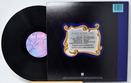 Vinyl record with cover displaying text and a logo on a white background