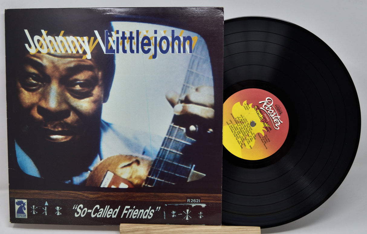 Vinyl record with cover featuring a musician and album title 'So-Called Friends' by Johnny Littlejohn.