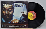Vinyl record with cover featuring a musician and album title 'So-Called Friends' by Johnny Littlejohn.
