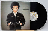 Vinyl record with a portrait of a person on the cover and a visible label.