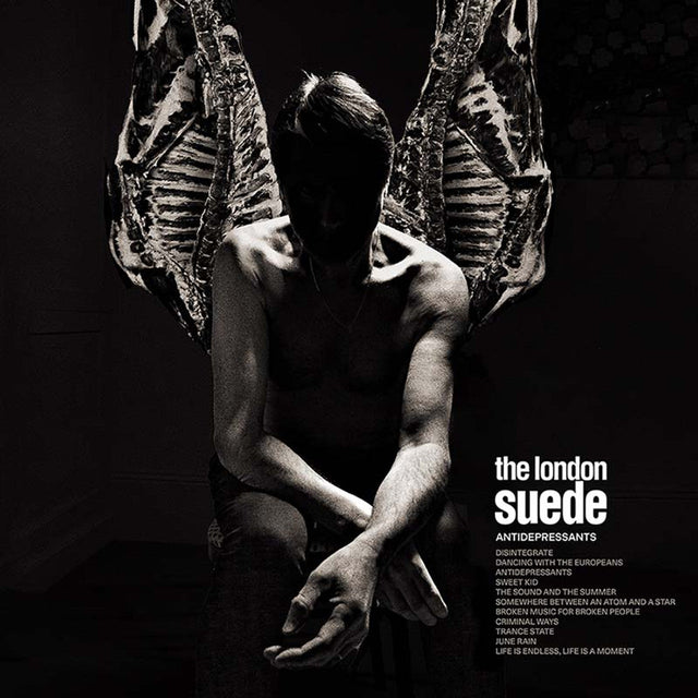 Dramatic black-and-white album cover featuring a shirtless figure with angel-like wings for London Suede's 'Antidepressants'