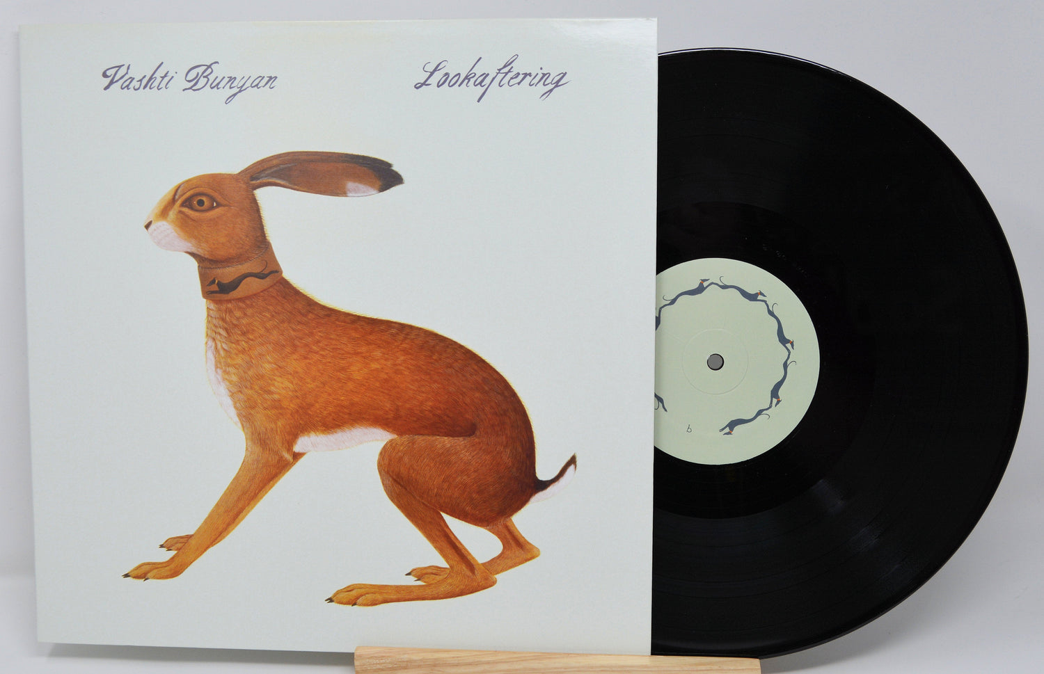 Lookaftering album cover with hare illustration and vinyl record