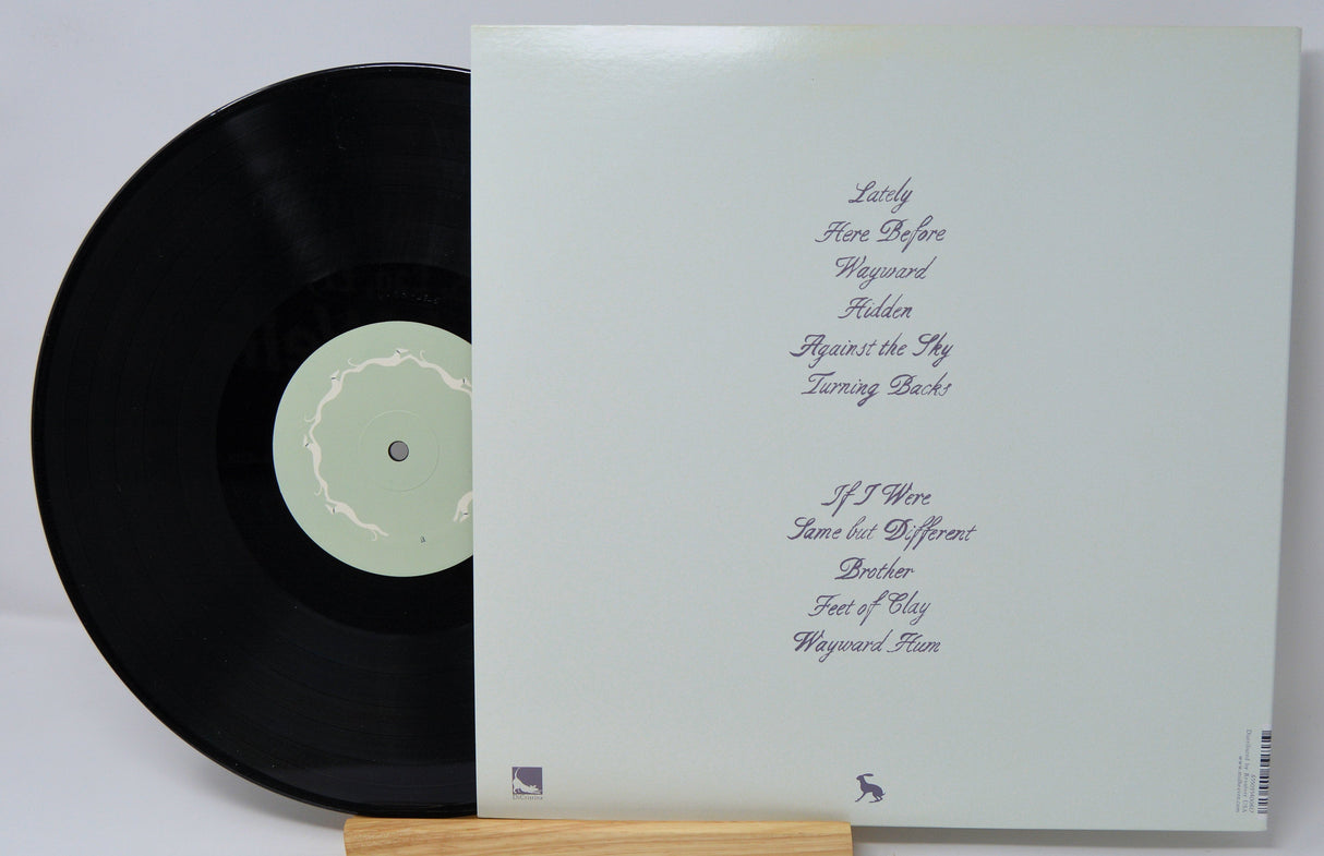 Lookaftering vinyl record with back cover showing tracklist