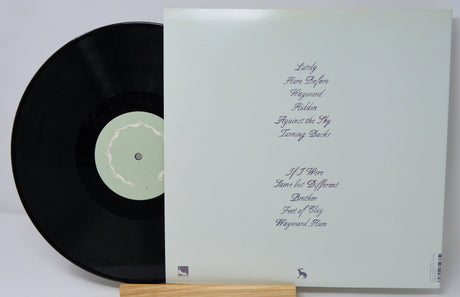 Lookaftering vinyl record with back cover showing tracklist
