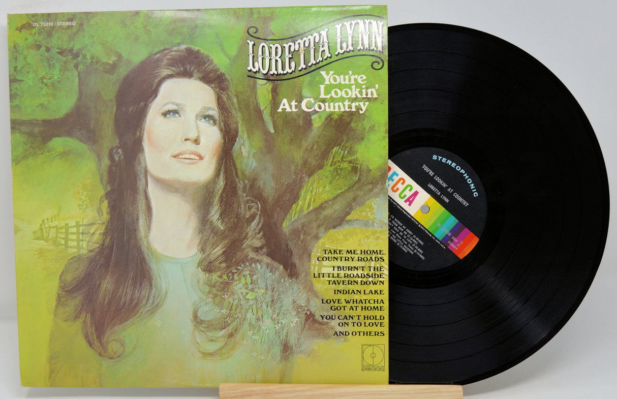 Front cover artwork of Loretta Lynn's 'You're Lookin' At Country' vinyl LP with painted portrait