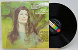 Front cover artwork of Loretta Lynn's 'You're Lookin' At Country' vinyl LP with painted portrait