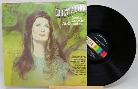 Front cover artwork of Loretta Lynn's 'You're Lookin' At Country' vinyl LP with painted portrait