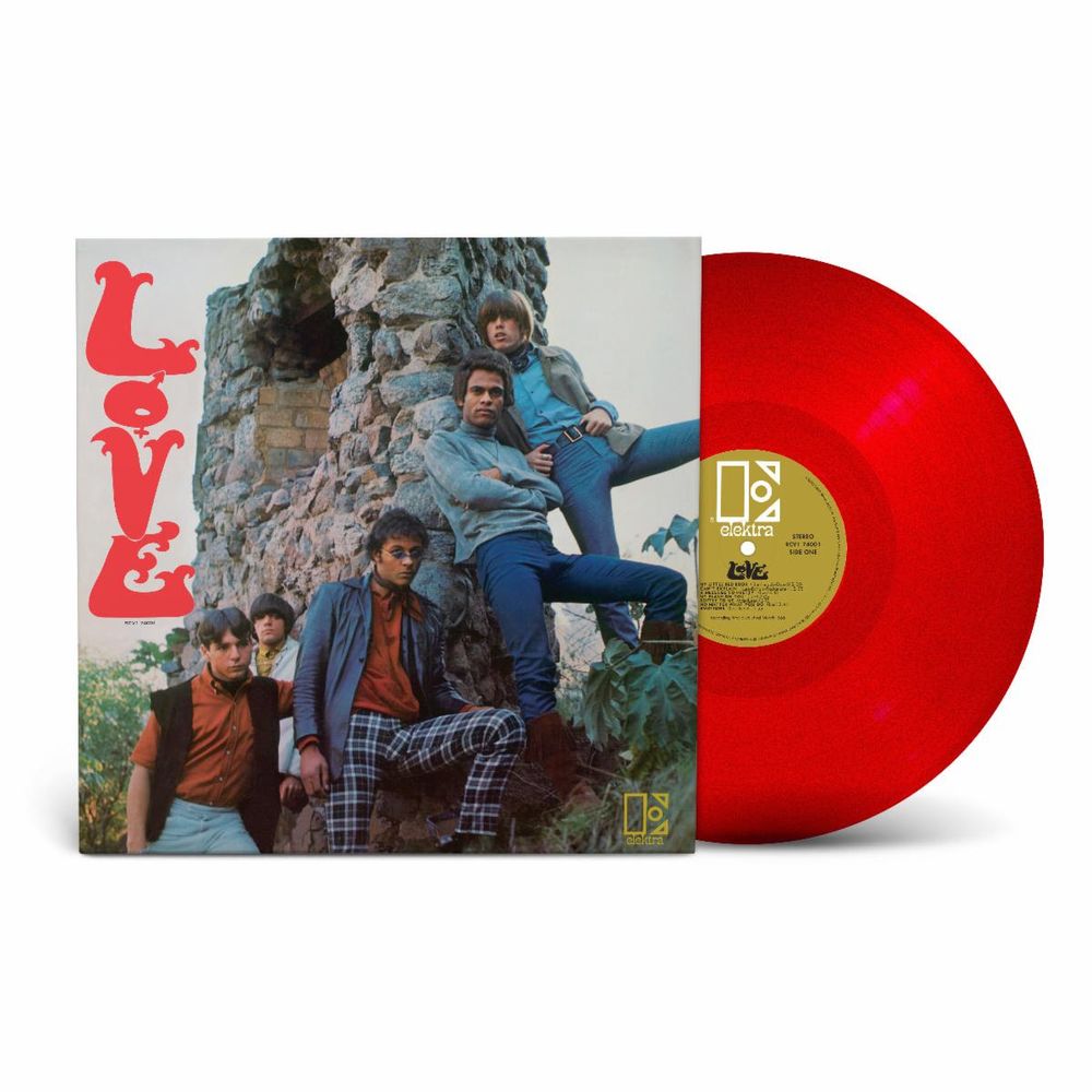 A vinyl record album shown with its cover partially pulled from the sleeve, revealing a bright translucent red record. The cover features a vintage-style photo of four young men sitting in front of a stone structure, with the word 'LOVE' in large red letters on the left and a gold center label.