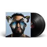Vinyl record with a cover featuring a person with butterflies on it, on a white background.