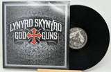 Front cover of Lynyrd Skynyrd God & Guns vinyl album with bold logo design