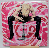 Vinyl record cover with a person in high heels and black stockings on a pink and white abstract background.