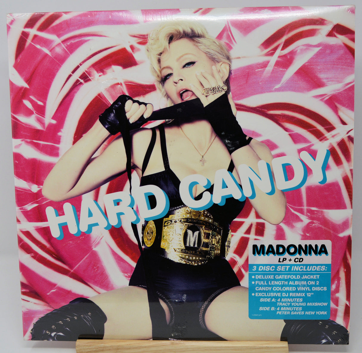 Album cover for 'Hard Candy' by Madonna with a colorful design and text.
