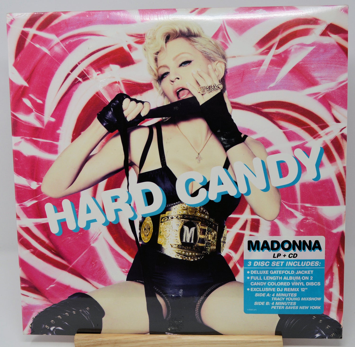 Album cover for 'Hard Candy' by Madonna with a colorful design and text.