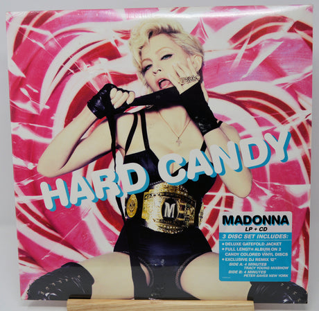 Album cover for 'Hard Candy' by Madonna with a colorful design and text.