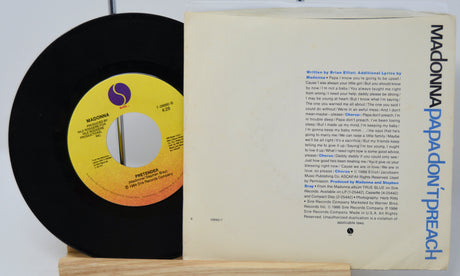 A used 7-inch vinyl record of Madonna's 'Papa Don't Preach' with the cover displayed alongside.
