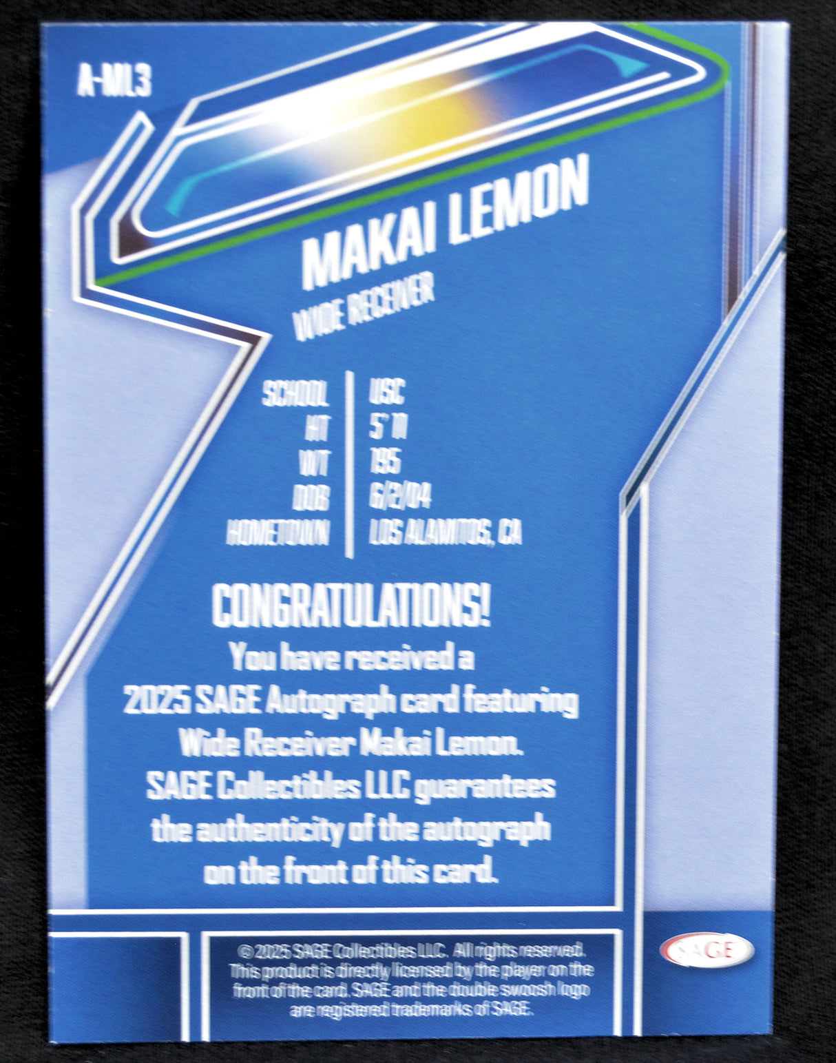 Blue trading card with Makai Lemon's name and details on a black background