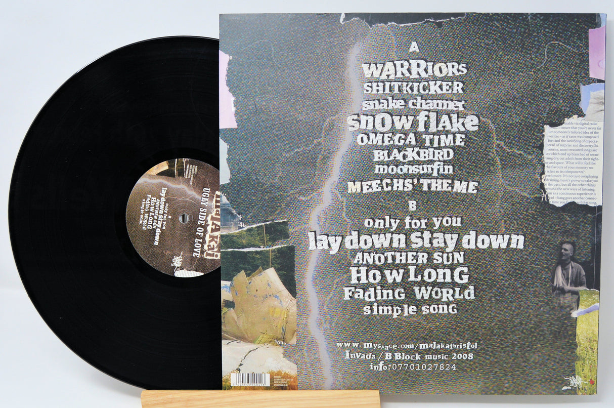 Malakai Ugly Side of Love vinyl record with back cover showing tracklist and collage artwork